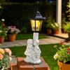Solharzlampe, Gartenskulptur mit Licht, Junge und Mädchen Figur im amerikanischen Stil Außenlaterne, Vintage Kinder halten sechseckige Lampe