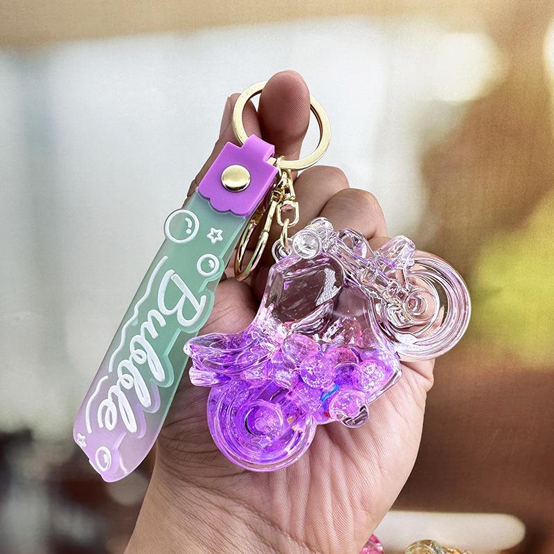 

Креативний барвистий брелок-пляшка з дрифтом для мотоцикла - Мила кришталева іграшка-антистрес з рухомим піском та маленька прикраса на день народження Separate OPP Bag фіолетовий