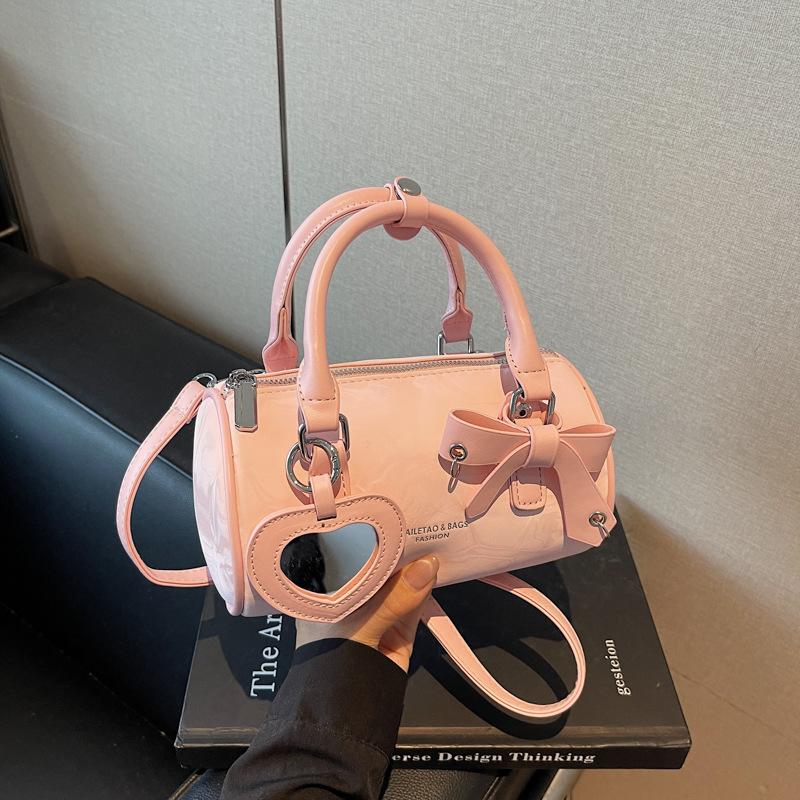 Fashion portable bow cylinder bag women's summer new personalized mirror pendant shoulder messenger bag