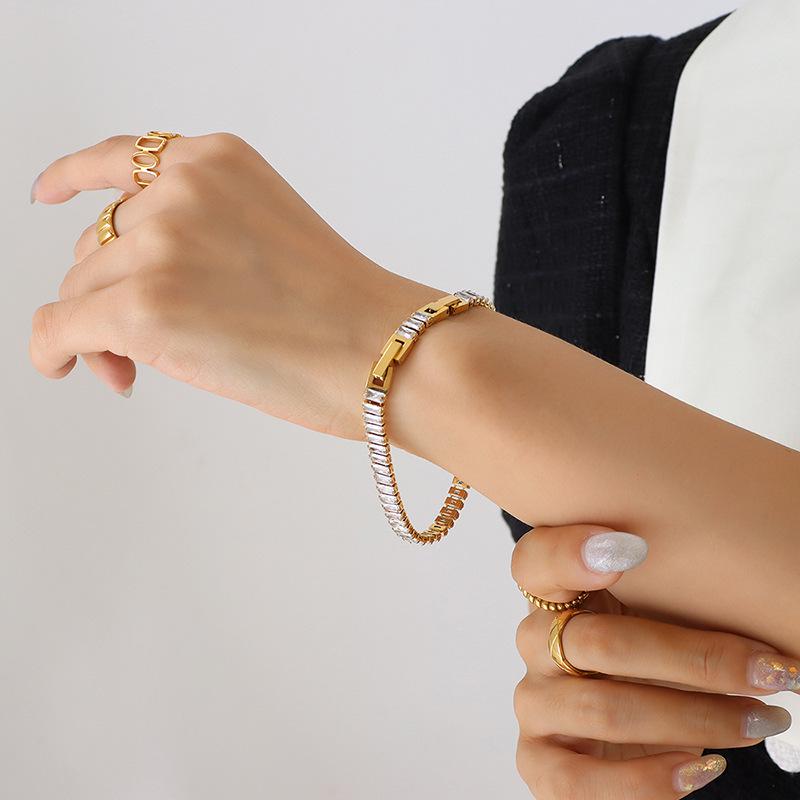 

Европейский и американский набор из ожерелья и браслета из титановой стали с красочной циркониевой инкрустацией - Легкая роскошь для женщин