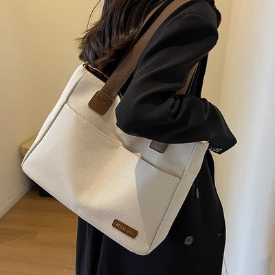 Canvas-Tasche Damen große Kapazität 2025 neue Mode vielseitige Schultertasche Stofftasche Textur Klasse Tragetasche