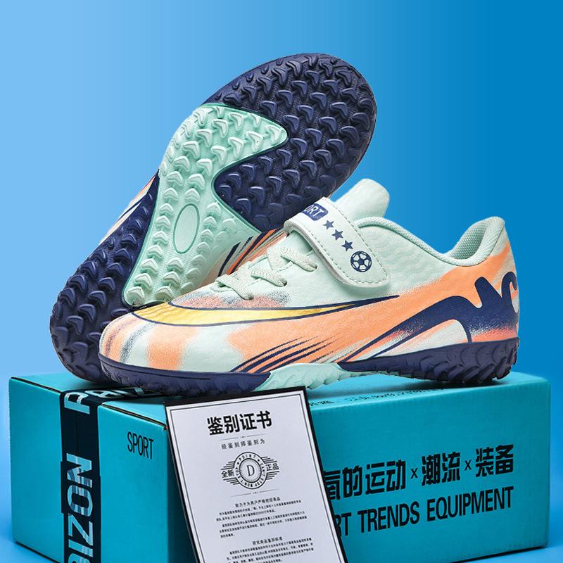 Genuine 2025 new children's football shoes students boys and girls broken nails Velcro breathable training shoes factory direct sales