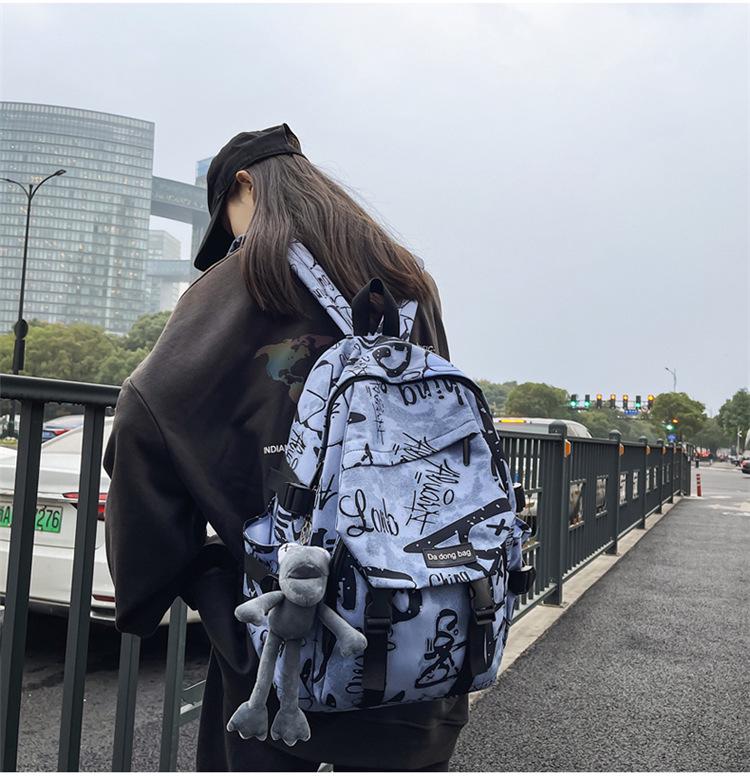 Trendy Graffiti Large Capacity Backpack for Students - Versatile Shoulder Bag for Men & Women