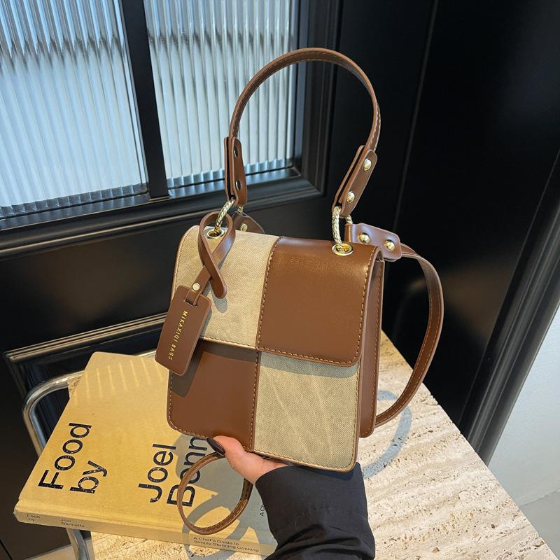 

Popular niche design splicing portable small square bag new fashionable contrasting color shoulder messenger bag