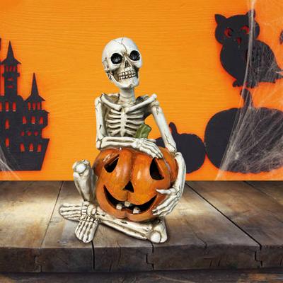Halloween ozdoba lebky se světlou dýňovou cetkou Strašidelná pryskyřicová kostra LED ozdoba pro domácnost