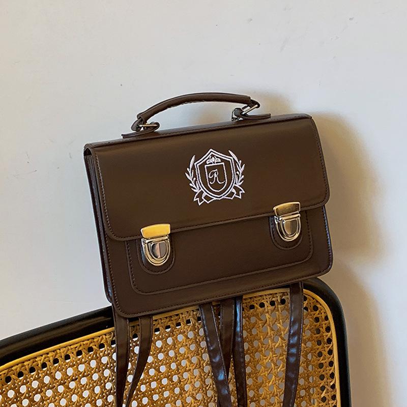 

2024 Japanese JK Uniform Vintage Shoulder Bag: Handbag, Messenger, Crossbody, and Backpack in One коричневий