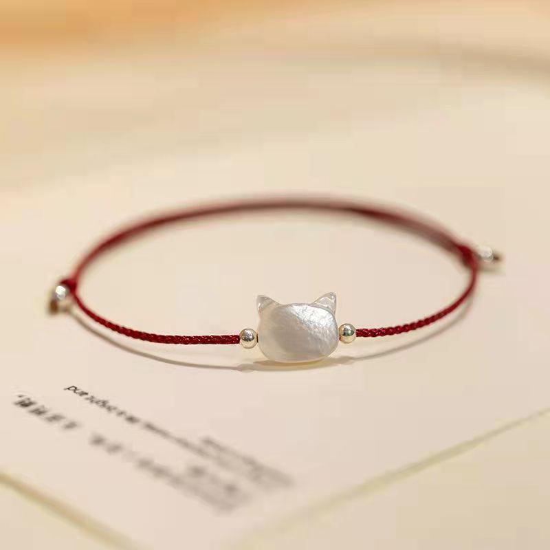 

Черно-белый браслет с кошкой из ракушек: Милый, Свежий, Роскошный Парный Стиль - Подарок на Год Дракона