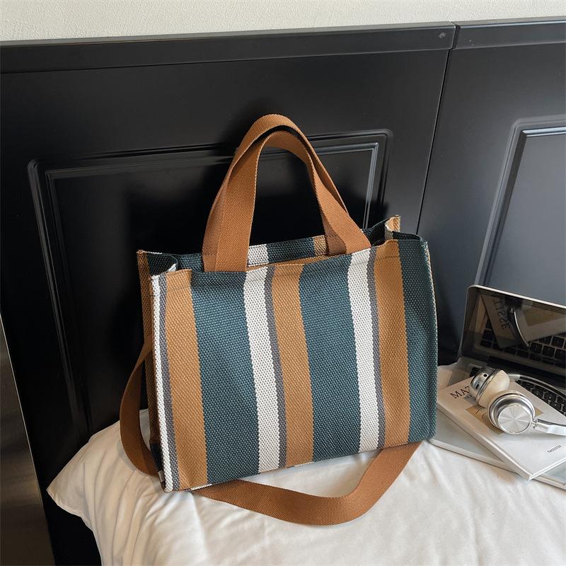 Korean version of canvas shoulder bag 2025 autumn and winter new literary stripes large-capacity student tote bag fashion shopping bag