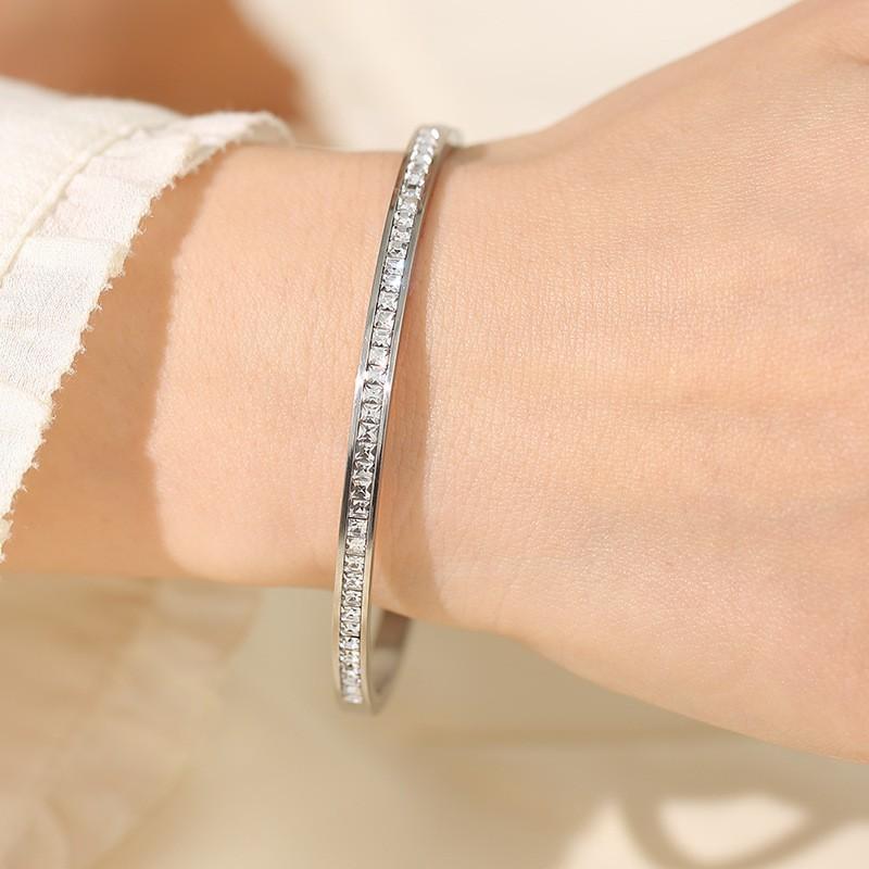 

Elegant Metal Bangle Bracelet with Embedded Clear Cubic Zirconia Stones Slim Design Durable Construction for Daily Wear and Special Occasions One Size серебряный