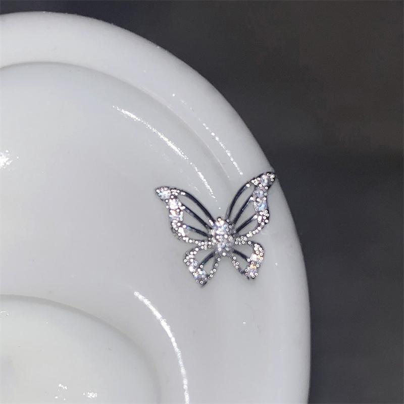 

Shiny Silver Color Rhinestone Hollow Butterfly 316L Stainless Steel Ear Bone Nail Delicate Waterproof Small Earrings for Women