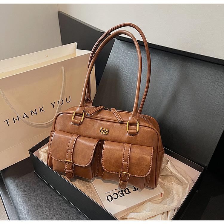 Retro niche portable bowling bag for women 2025 autumn new trendy Korean underarm bag large-capacity commuter bag