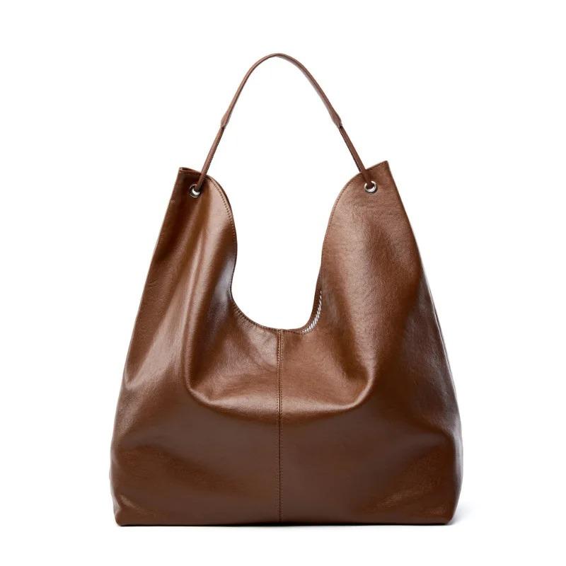 2026 New Vegetable Tanned Cowhide Popular Large Capacity Textured Tote Bag Versatile E Shoulder Class Underarm Commuting Bag