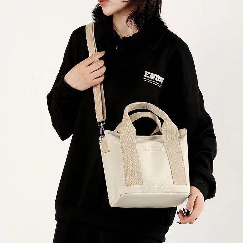Canvas bag Portable messenger bento bag Large capacity bag Fashion trend One shoulder messenger women's bag