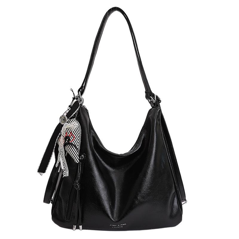 

High-end large-capacity tote bag women s spring versatile niche shoulder bag casual simple backpack bag No pendant model чорний