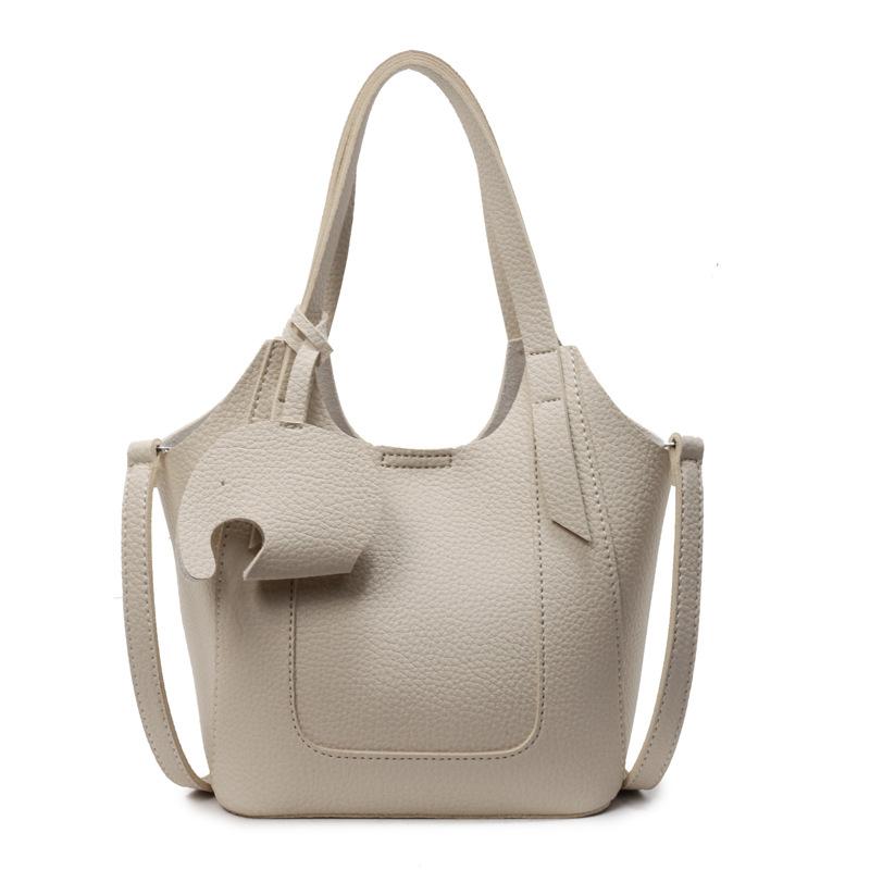 Premium foreign style portable bucket bag women's 2025 new fashion versatile shoulder bag simple commuter messenger bag