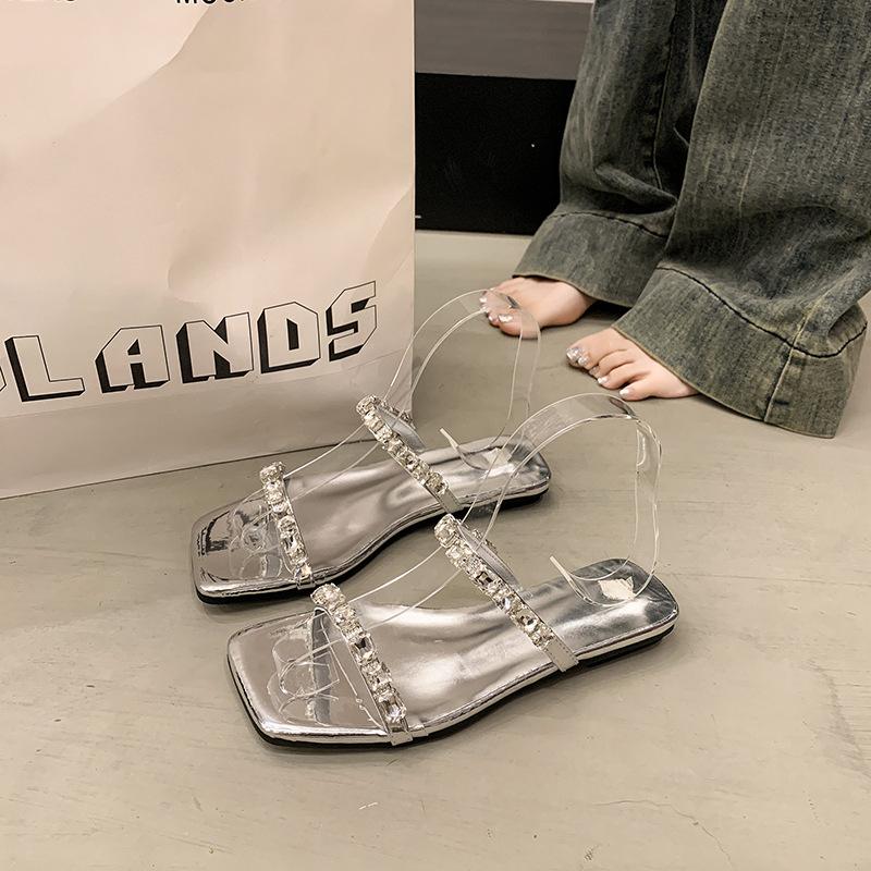 Slippers women s summer outer wear fashionable new versatile low-heeled rhinestones with skirts flat bottom one-word cool slippers 40 серебряный 3340₽