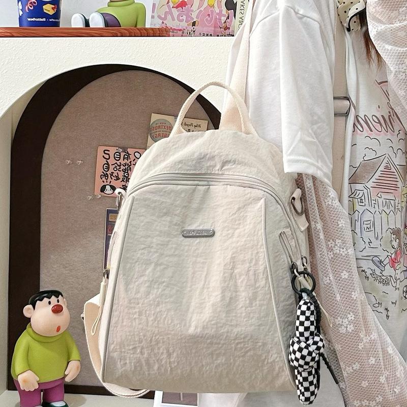 Versatile solid color women's backpack large-capacity leisure bag simple backpack light schoolbag light luxury student bag commuter bag