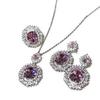 Luxurious high-end three-piece set of European and American style full diamond inlaid sea blue gemstone jewelry set with ring, earrings, and pendant