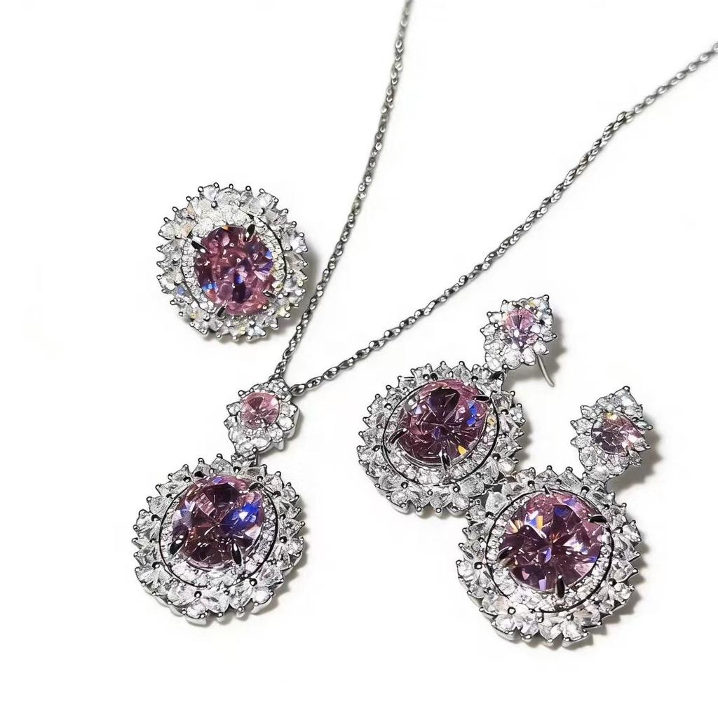 Luxurious high-end three-piece set of European and American style full diamond inlaid sea blue gemstone jewelry set with ring, earrings, and pendant