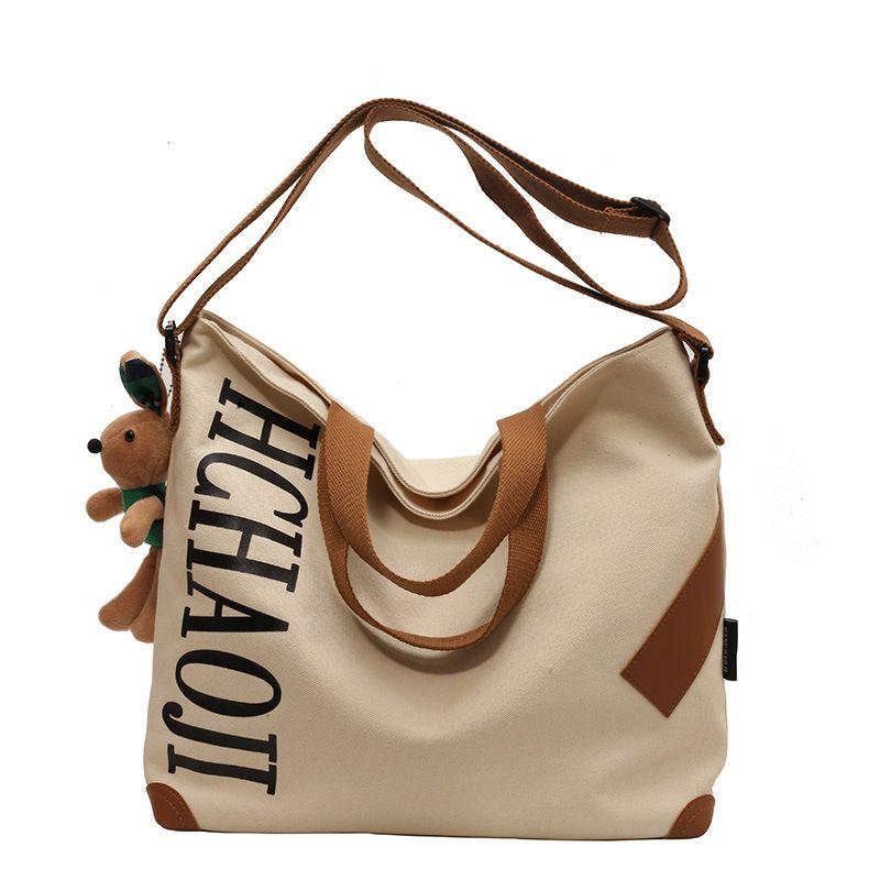 

German Canvas Bag Large Capacity Women s Bag Casual All-matching Shoulder Messenger Bag College Students Class Commuting Tote Bag Women Khakis