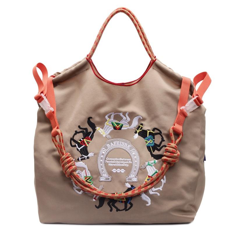 Literary small fresh embroidery pony contrasting color large capacity women's armpit bag new women's shoulder messenger bag