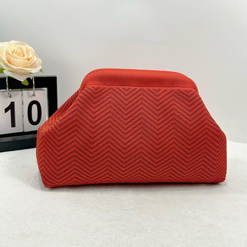 Knitted bag, striped clutch bag, women's flying woven clouds, versatile temperament, portable cosmetic bag, large capacity