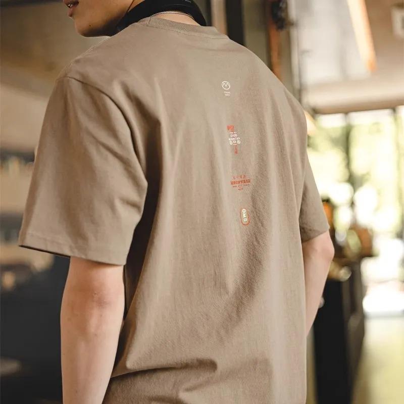 Pánské bílé tričko s krátkým rukávem a kulatým výstřihem s grafickým potiskem a oversized střihem pro ležérní streetwear módu