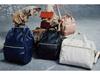 Rakuten Women's PU Leather Gold-Mouth Backpack - Travel & School Bag