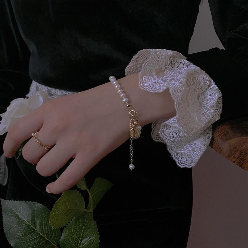 Luxury Niche Imitation Pearl Bracelet for Women Elegant Hollow Blessing Lucky Long Tassel Adjustable Bracelet Birthday Gifts