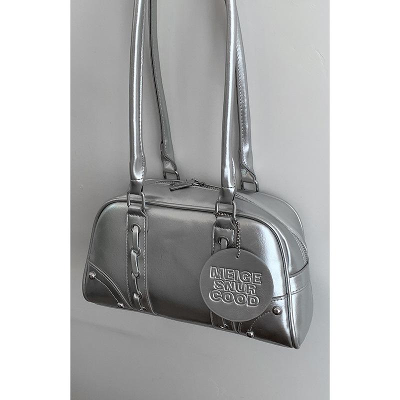 

Women s bag niche high-end bowling bag 2025 new simple shoulder commuter underarm bag simple pillow bag срібний