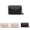 Versatile Women's Leather Clutch Handbag With Classic Appeal And Adjustable Strap