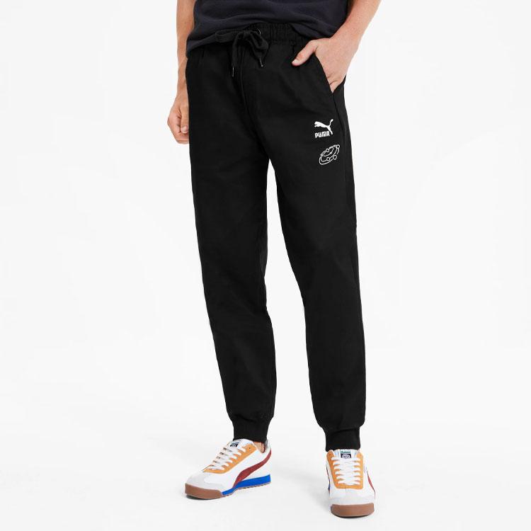 Puma Pantaloni casual țesuți X Tyakasha Bărbați Pantaloni negri 595560-01