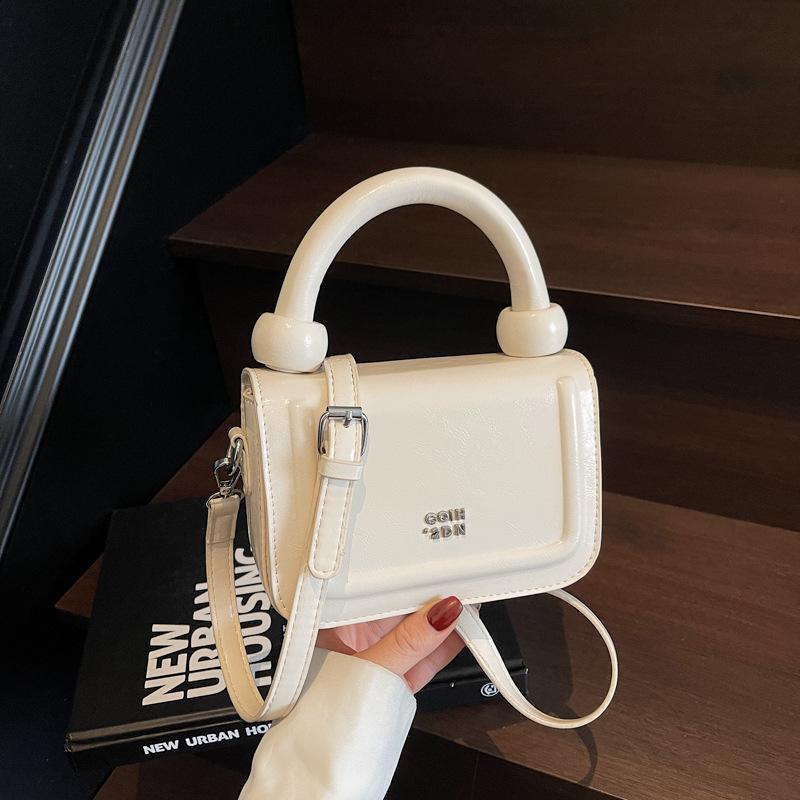 Simple high-end portable small square bag 2025 summer new niche trend fashion casual versatile shoulder women's bag