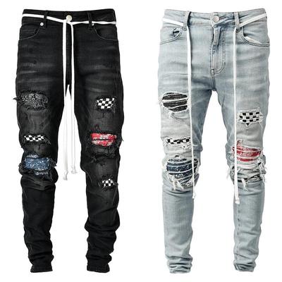 Neue High-End-Jeans für Herren mit schmaler Passform und Rissen am Knöchel. Neue Jeans für Herren