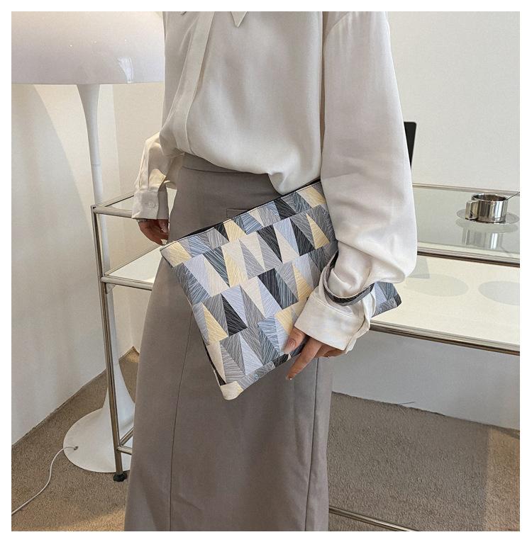 Texturierte kleine Tasche Damentasche 2025 Frühling neuer Trend Mode Kontrastfarbe Handheld Handheld Unterarm Umschlagtasche