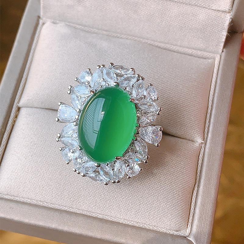 

Ювелирные изделия Медное основание Позолоченное Ледяной зернистый Флуоресценция Имитация Корунд Халцедон Набор 13 * 18