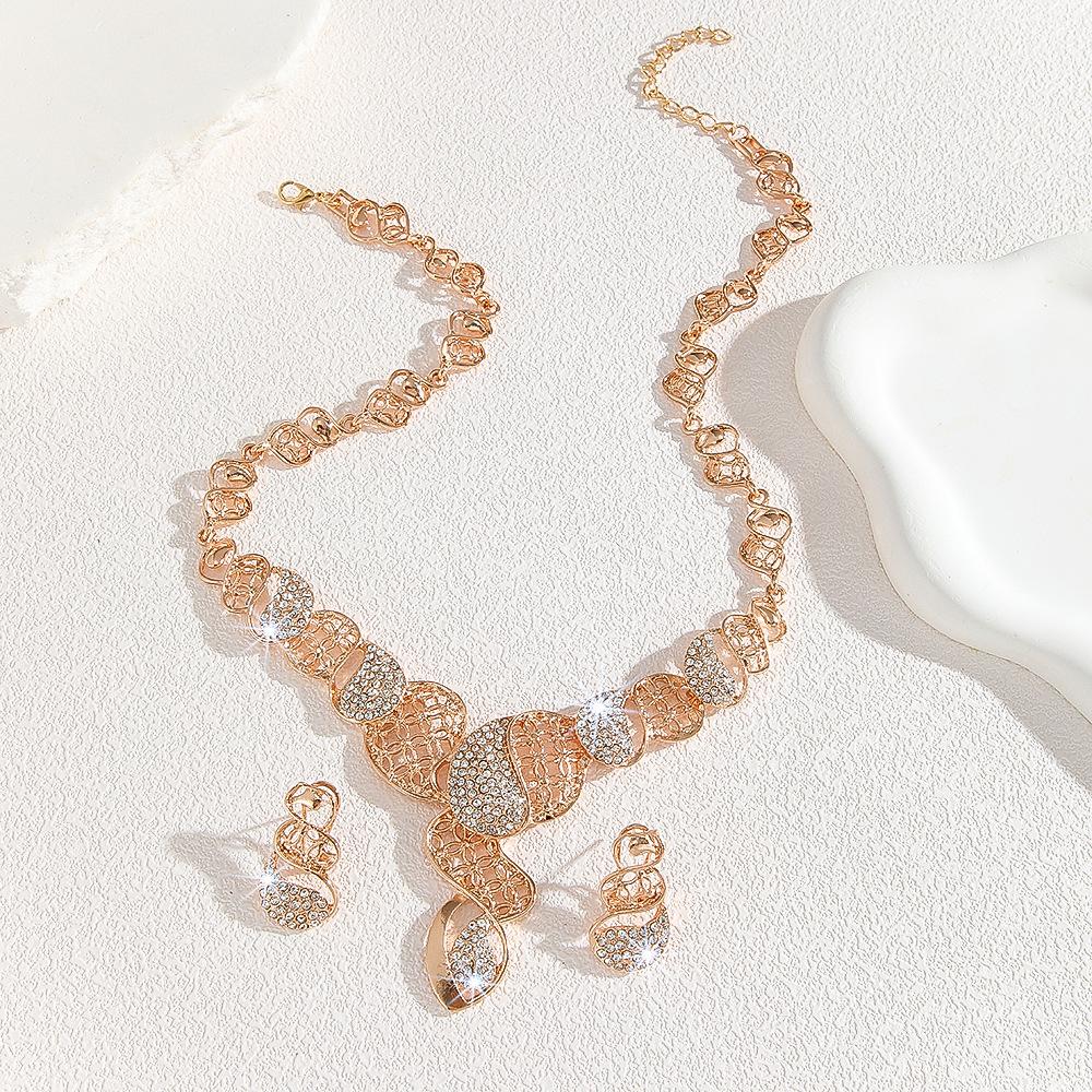 Gold Zinc Alloy Inlaid White Rhinestone Hollow Necklace Earrings Set Women's Jewelry