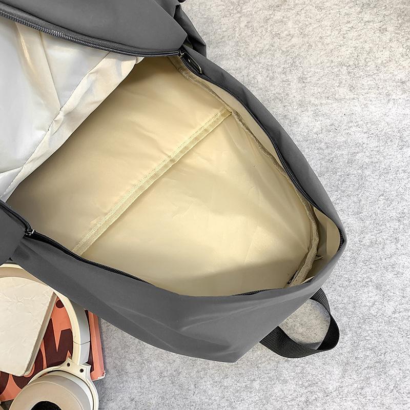 New large-capacity backpack, solid color middle and high school student travel bag, casual simple computer backpack