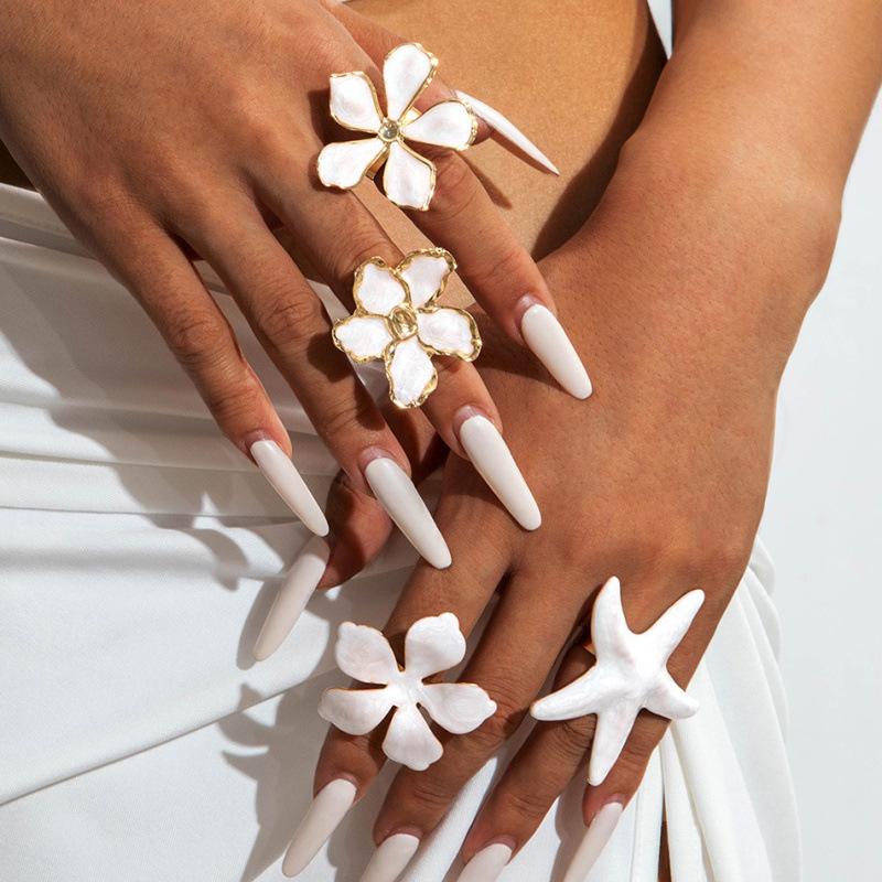 

Accessories, dripping oil five-petal flower three-dimensional ring exaggerated metallic starfish pearl ring