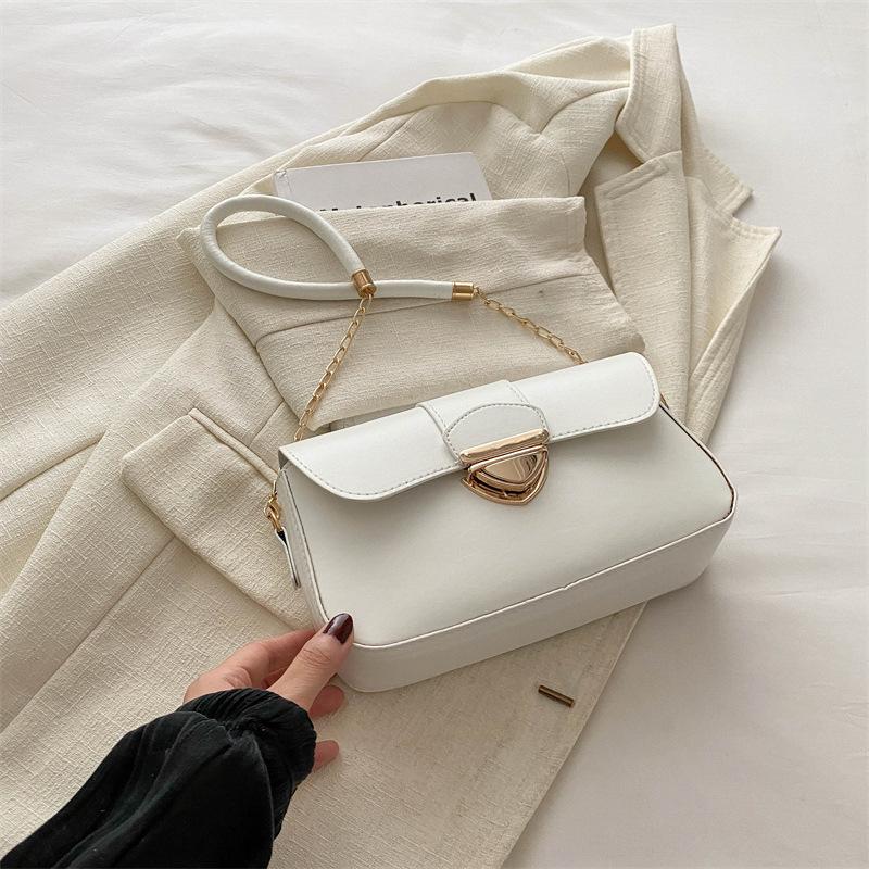 

New trendy retro messenger bag niche design shoulder armpit bag 2025 summer simple fashion small bag women білий