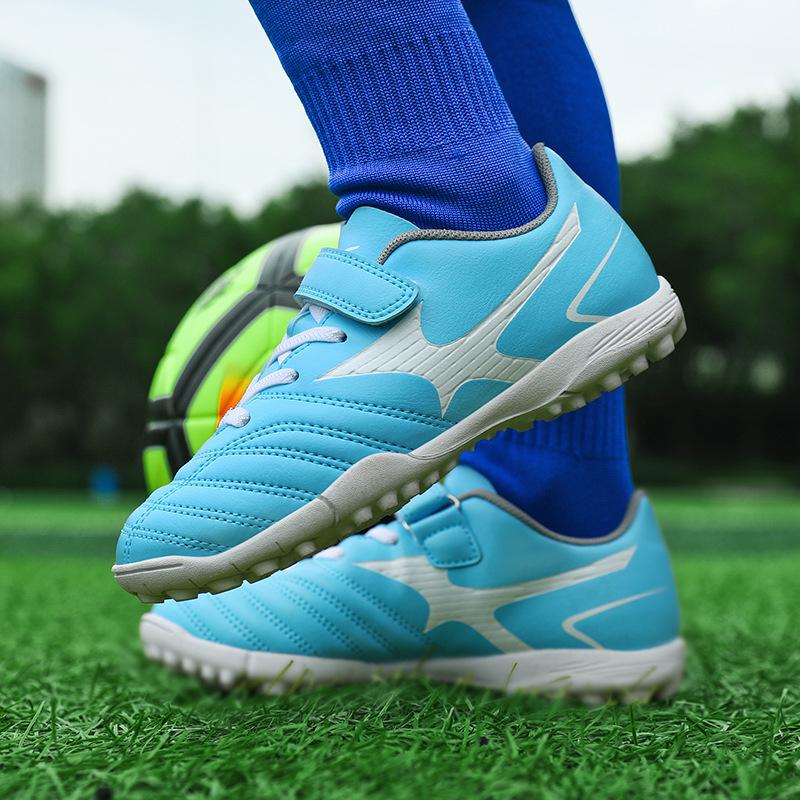 Manufacturer football shoes men's flat-soled adult grass spiked shoes adolescent boys and girls primary school students training TF broken spiked sho