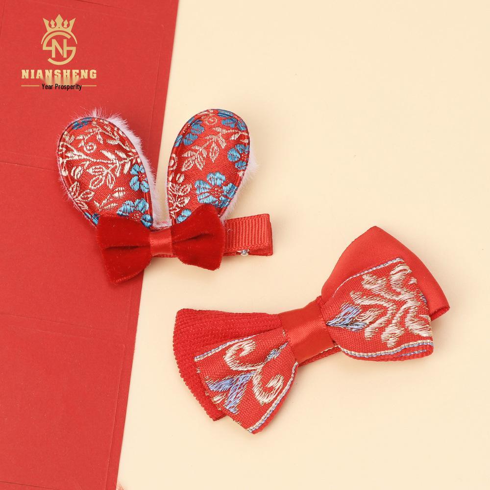 

Children s Red Festive Bow Hair Clip for New Year