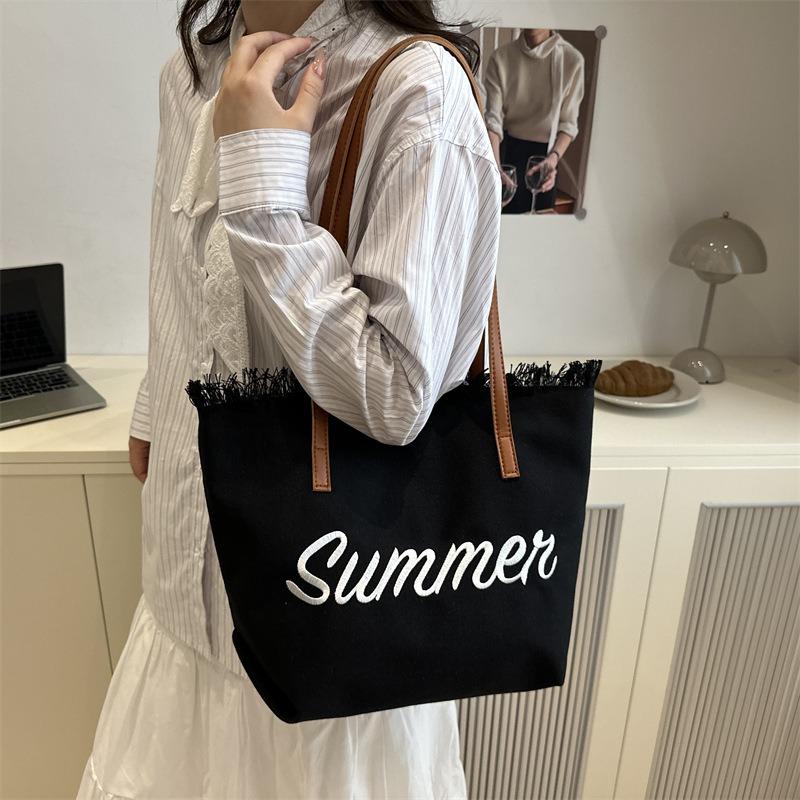 New Letter Tassel Canvas Bag Women's Versatile Largecapacity Simple Commuter Student Shoulder Tote Bag