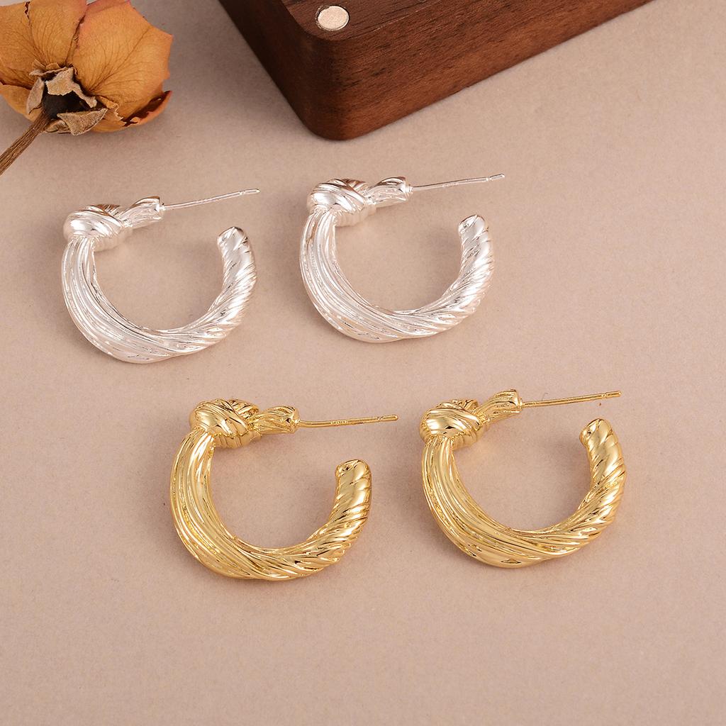 European and American cold wind knotted round earrings 925 retro design temperament stud earrings niche high-end earrings