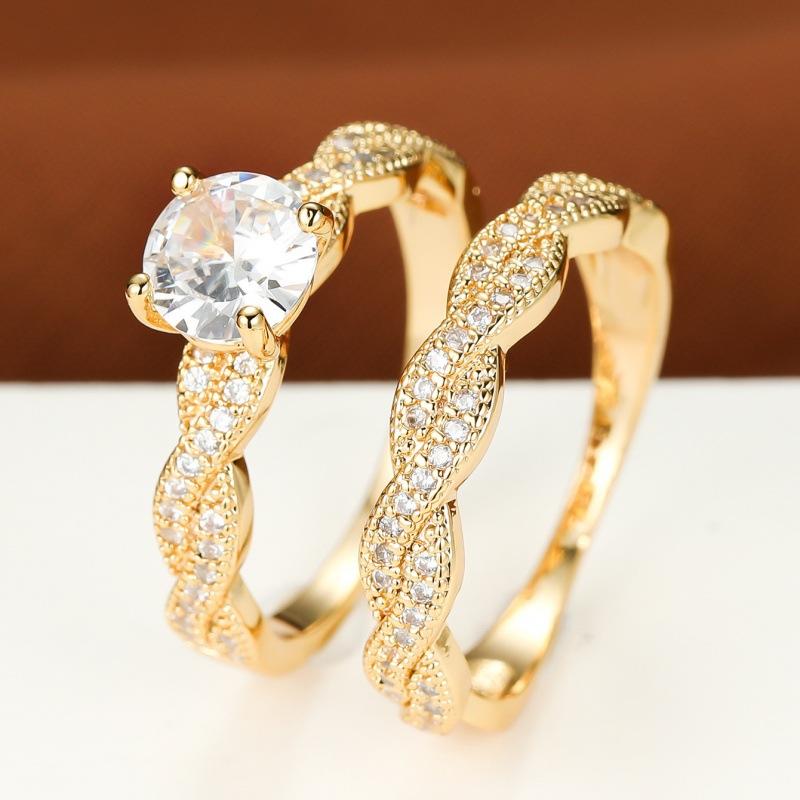 Simple gold four-claw round diamond full diamond cross twist set ring, women s model no. 6 золотой