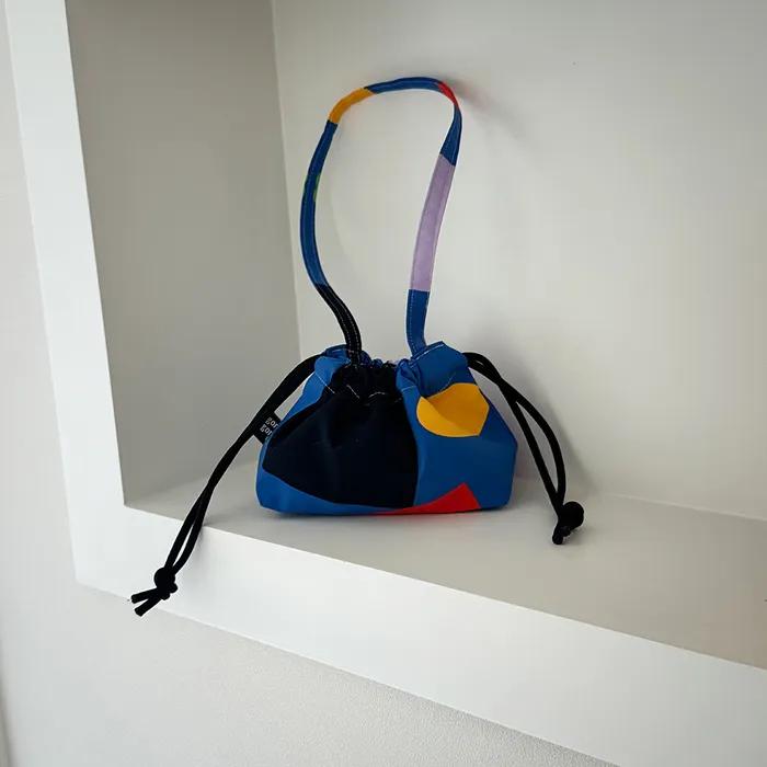 voyage mini string bag