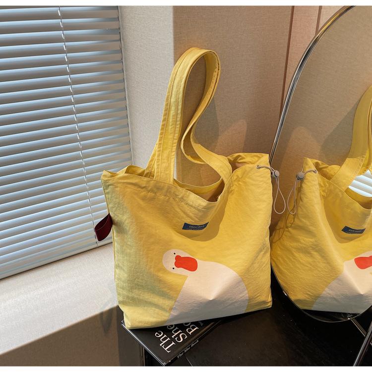 

Canvas bag women s large-capacity new summer casual versatile shoulder drawstring bag college student tote bag жёлтый