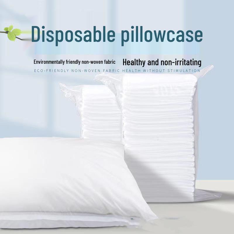 Travel-Sized Disposable Bedding Set: Sterilized 4-Piece Pack with Individually Wrapped Duvet Cover and Pillowcase for Train, Hotel, or B&B.