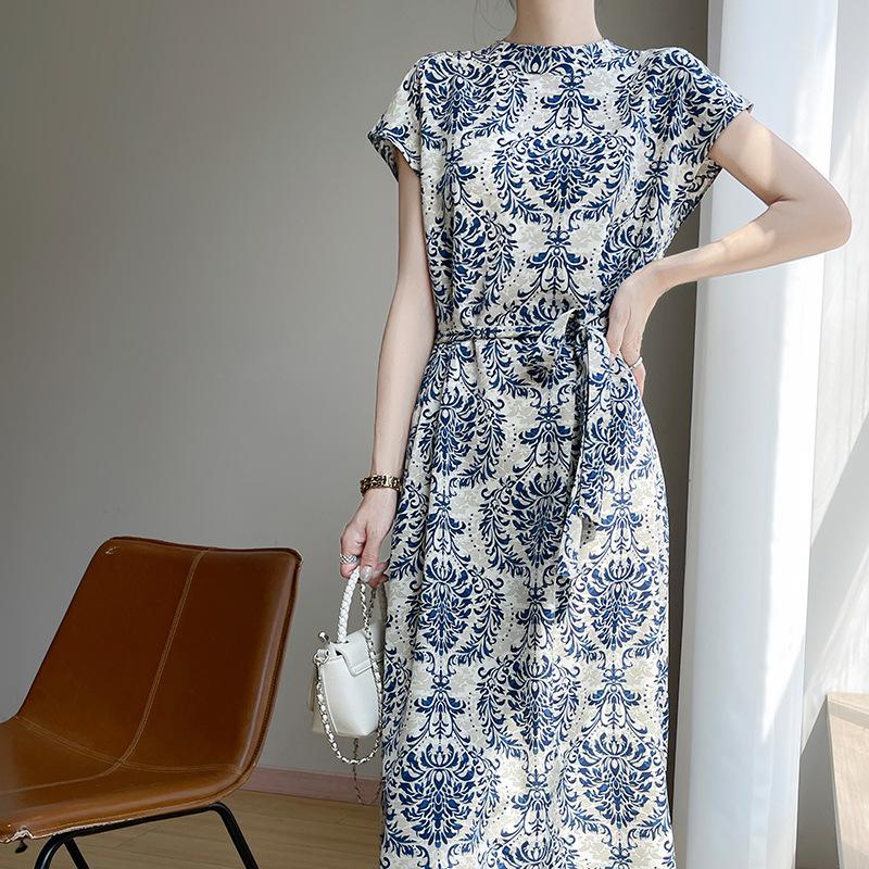Tempérament taille haute au-dessus du genou qui épouse la silhouette vous fait paraître mince et pure Robe décontractée à imprimé pour l'été des femmes Satin Polyvalente Jupe longue cool