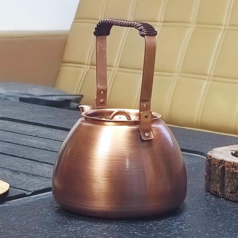 Handcrafted Exquisite Copper Electric Teapot, 1L Capacity, Purple Brass Finish with Handle - Perfect for Boiling Tea.